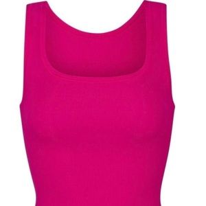 Skims Rasberry cotton tank in extra small. Never been worn.